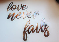 Fails word panel from Love Never Fails wall art accents showing 7x6.25 inch size