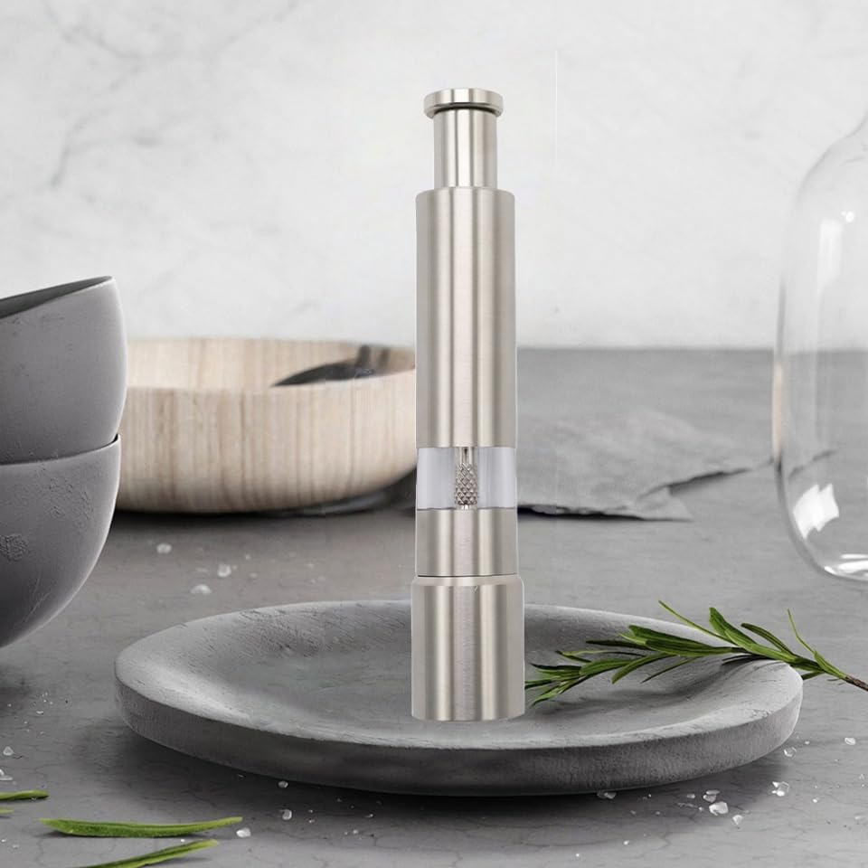 Thumb Pepper Grinder stainless steel with thumb-button design