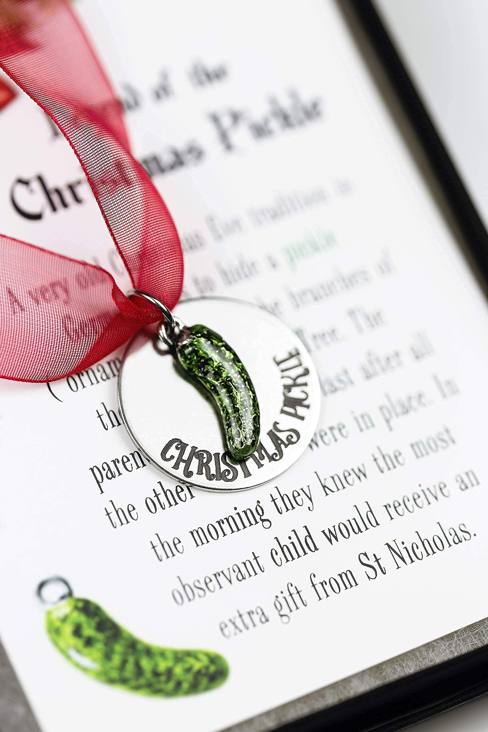 Tiny green pickle charm on stainless steel ornament