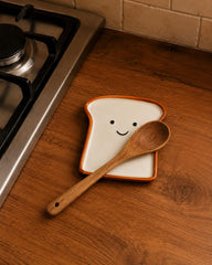 Ceramic spoon rest with dimensions 5.67L x 5.67W x 0.59H