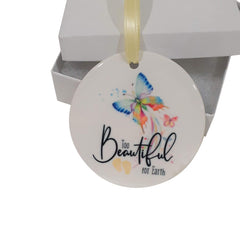 Too Beautiful For Earth ornament with yellow footprints