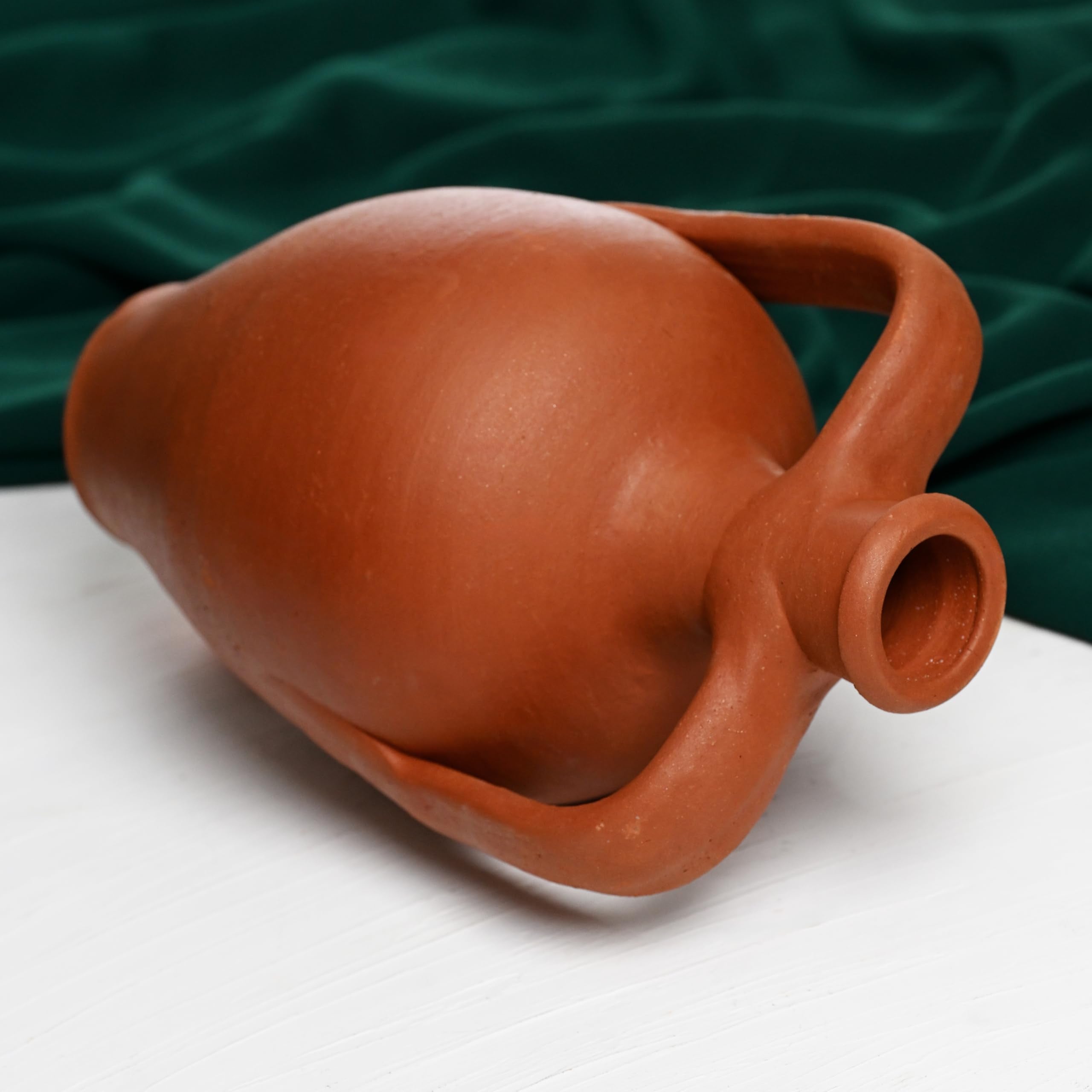 Traditional kitchen gift pottery jar in terracotta