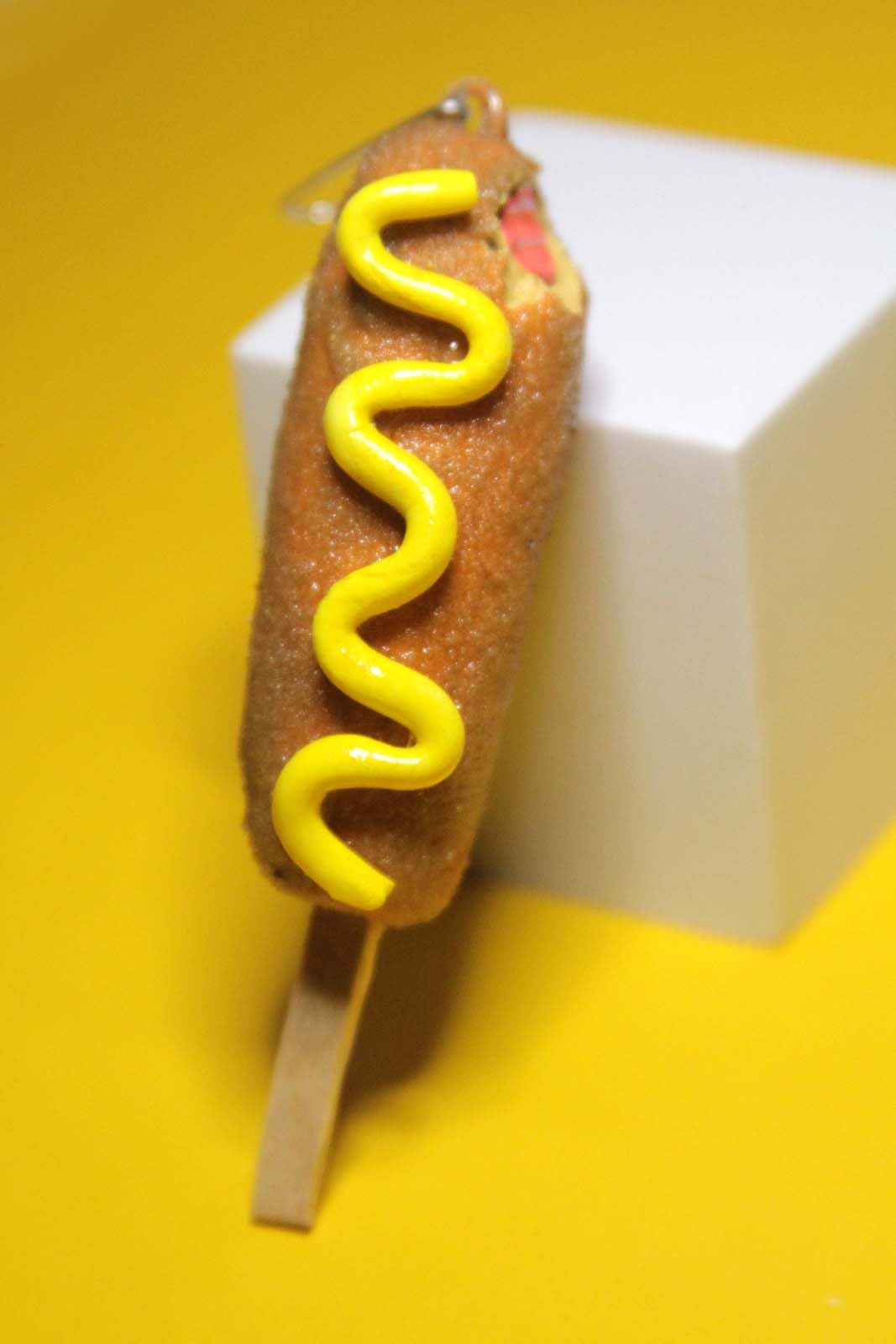 Festive foodie decor corndog ornament on tree