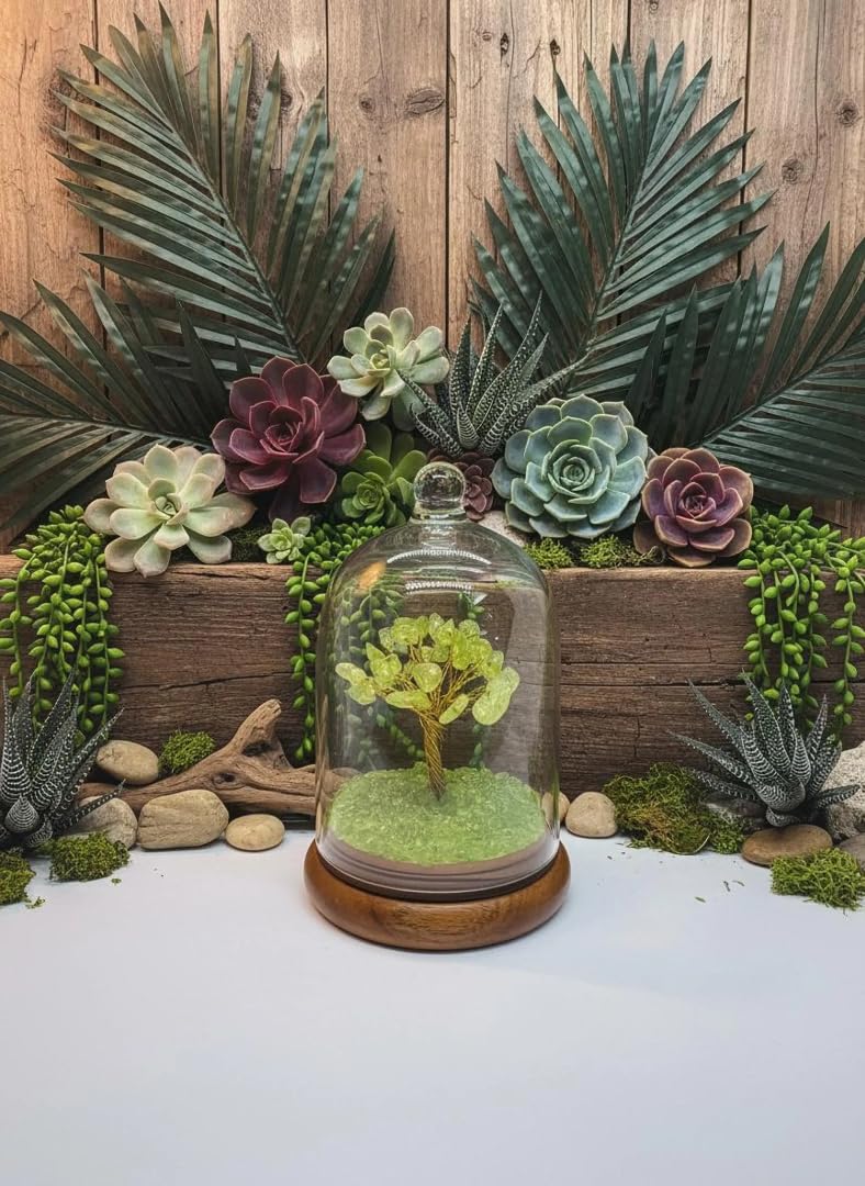 Tree of life sculpture displayed on polished wooden base