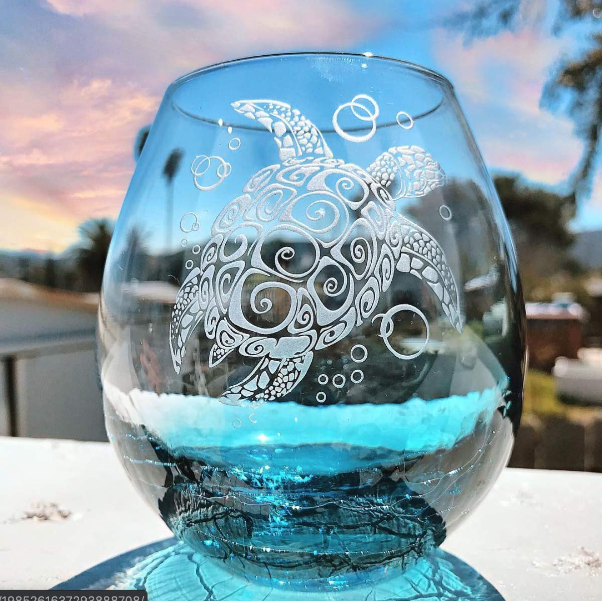 Handblown stemless wine glass with sand carved tribal sea turtle design
