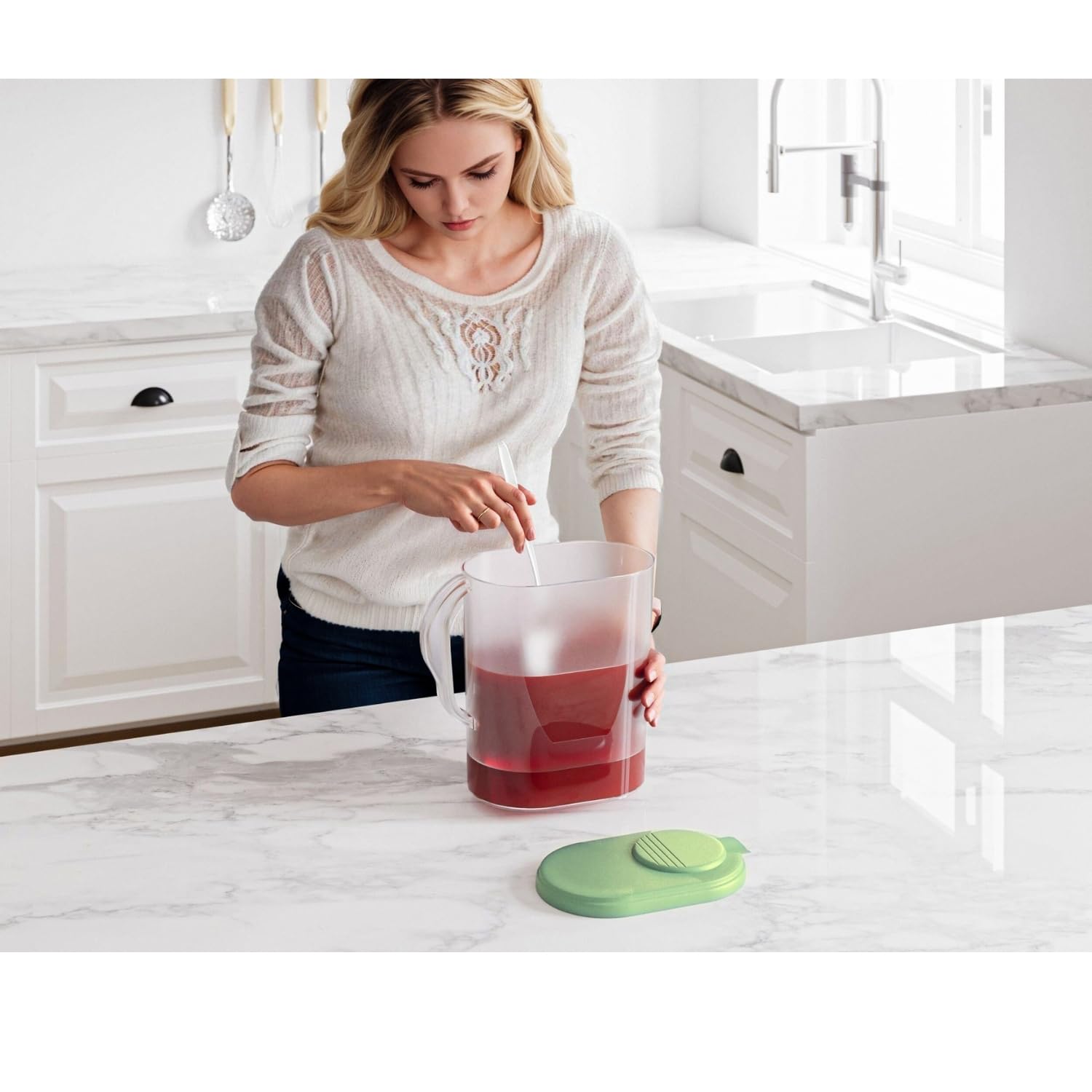 Pivot-top spout lid and ergonomic handle on 1-Gallon pitcher