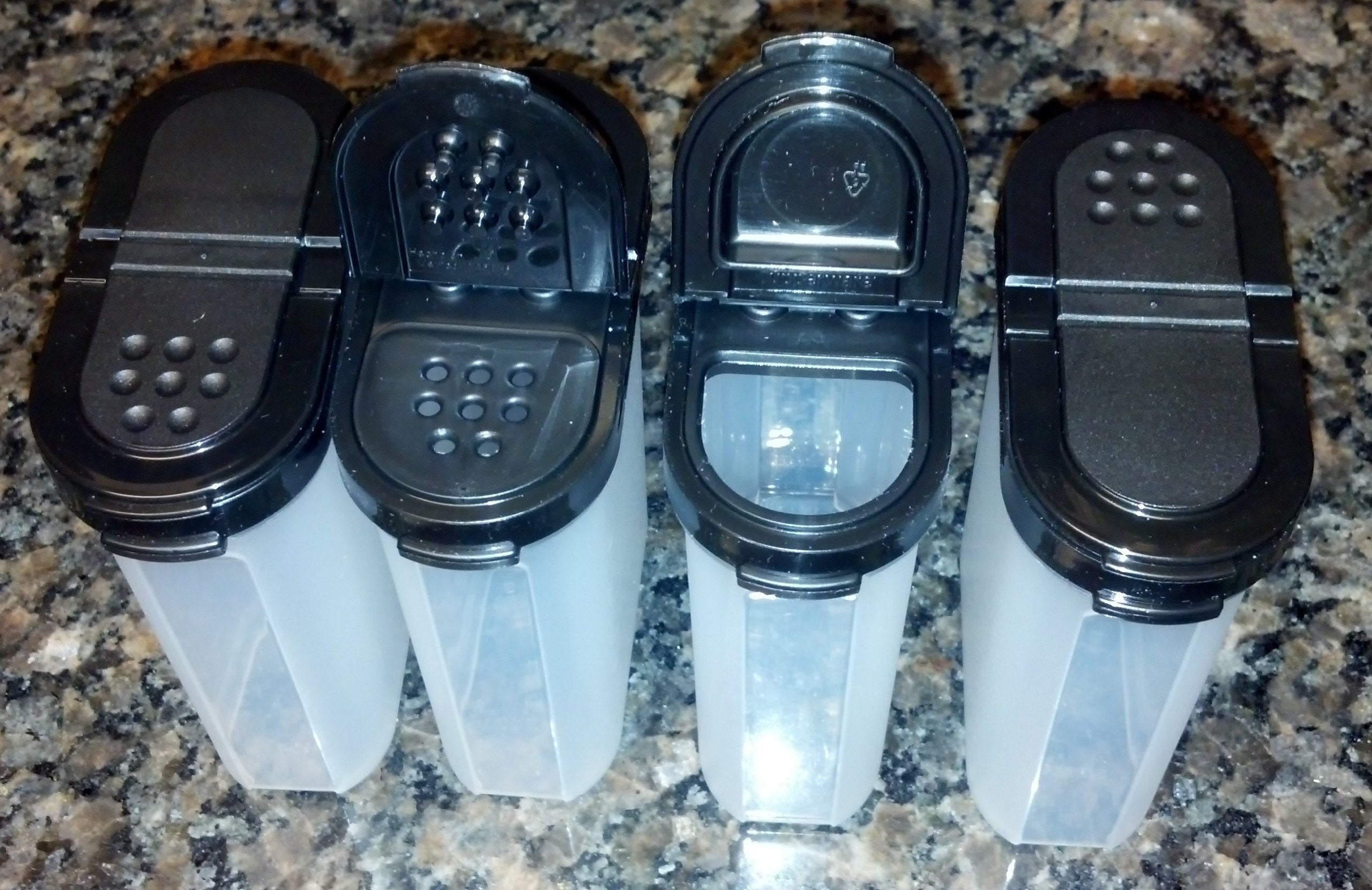 Tupperware large spice shaker set of four with black seals