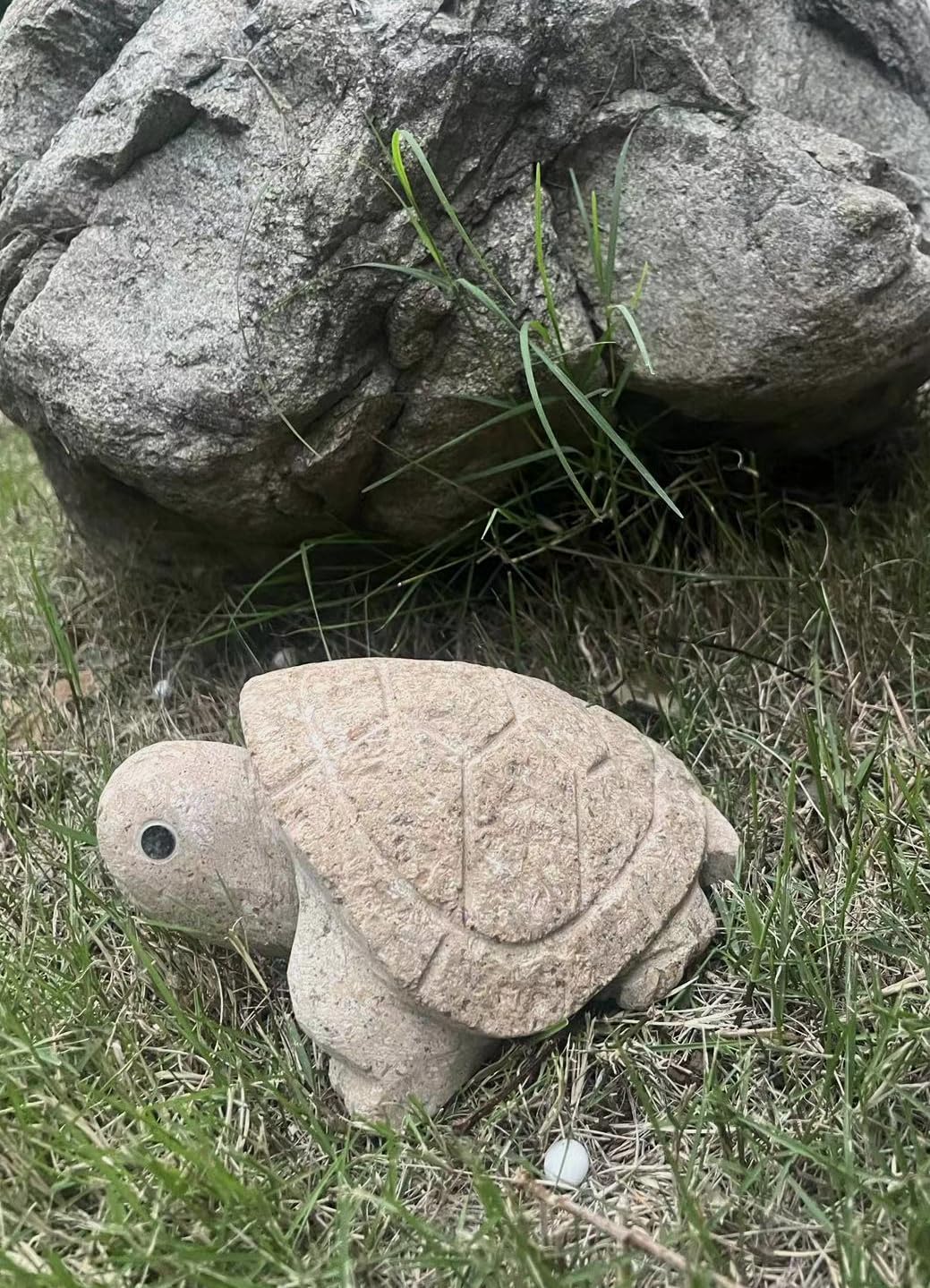 Turtle garden ornament carved from natural stone for yard decor