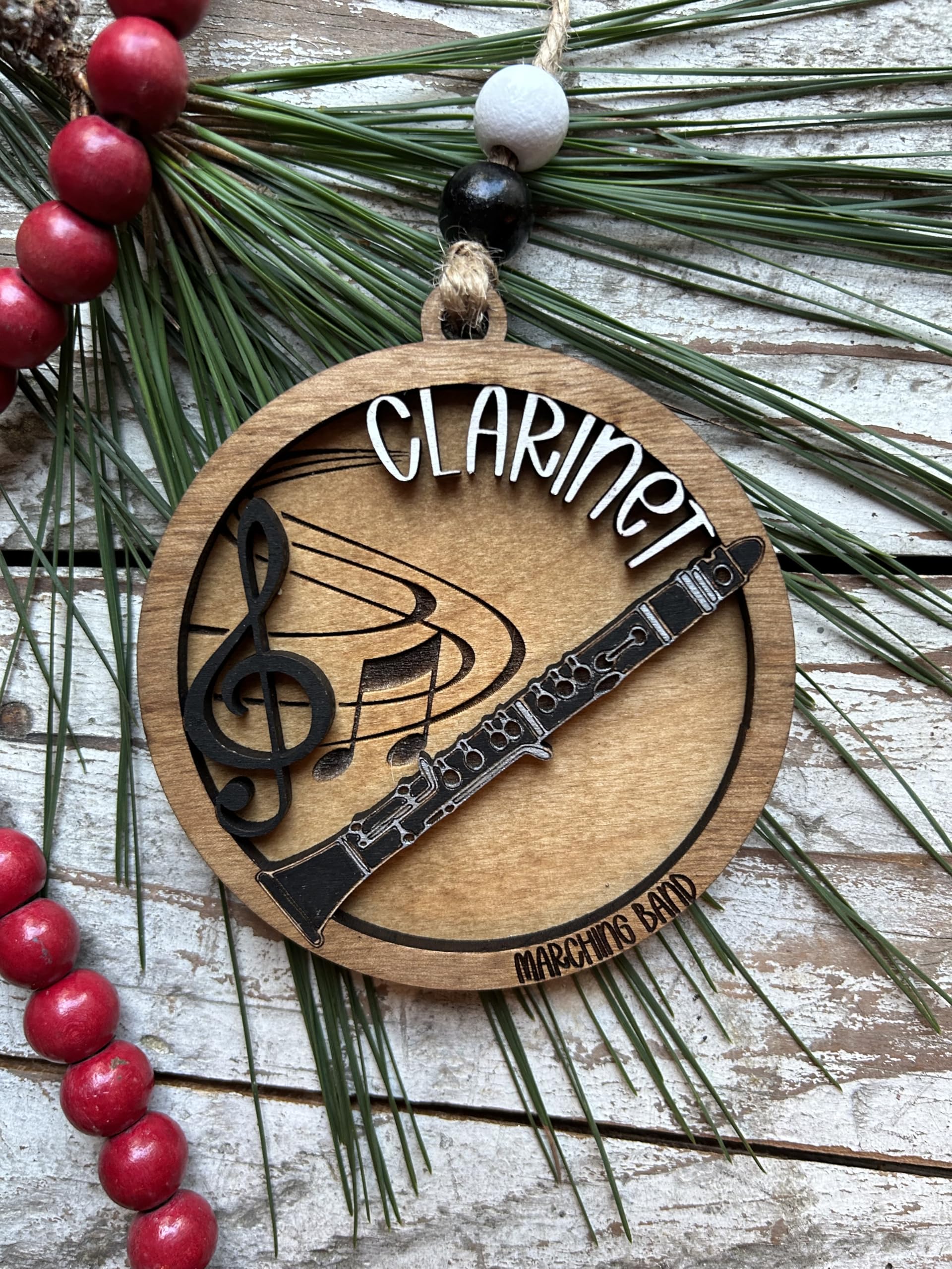 Approx 3 3/4 inch wide clarinet marching band ornament