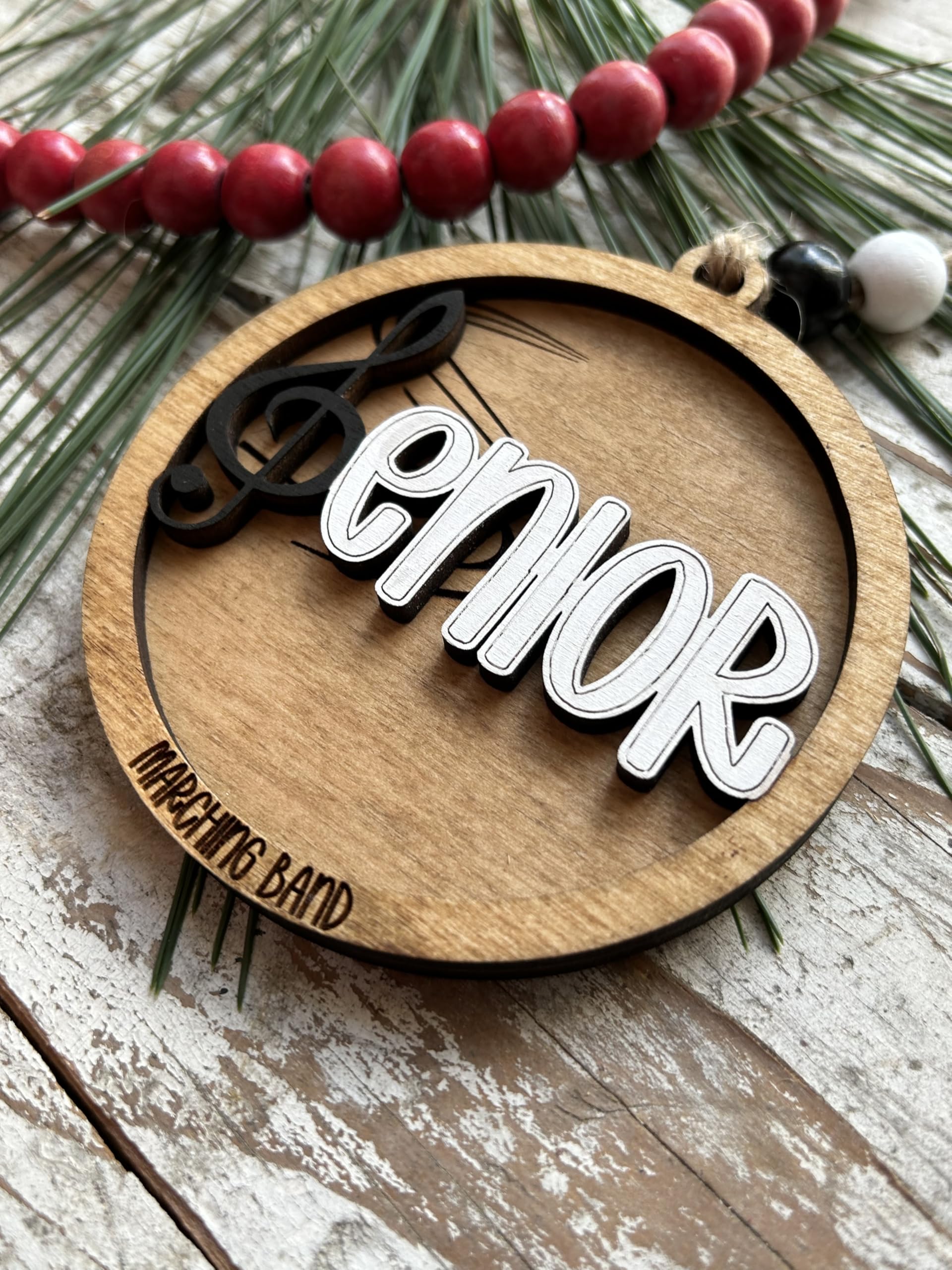 Two layer laser cut wood ornament made in North Carolina