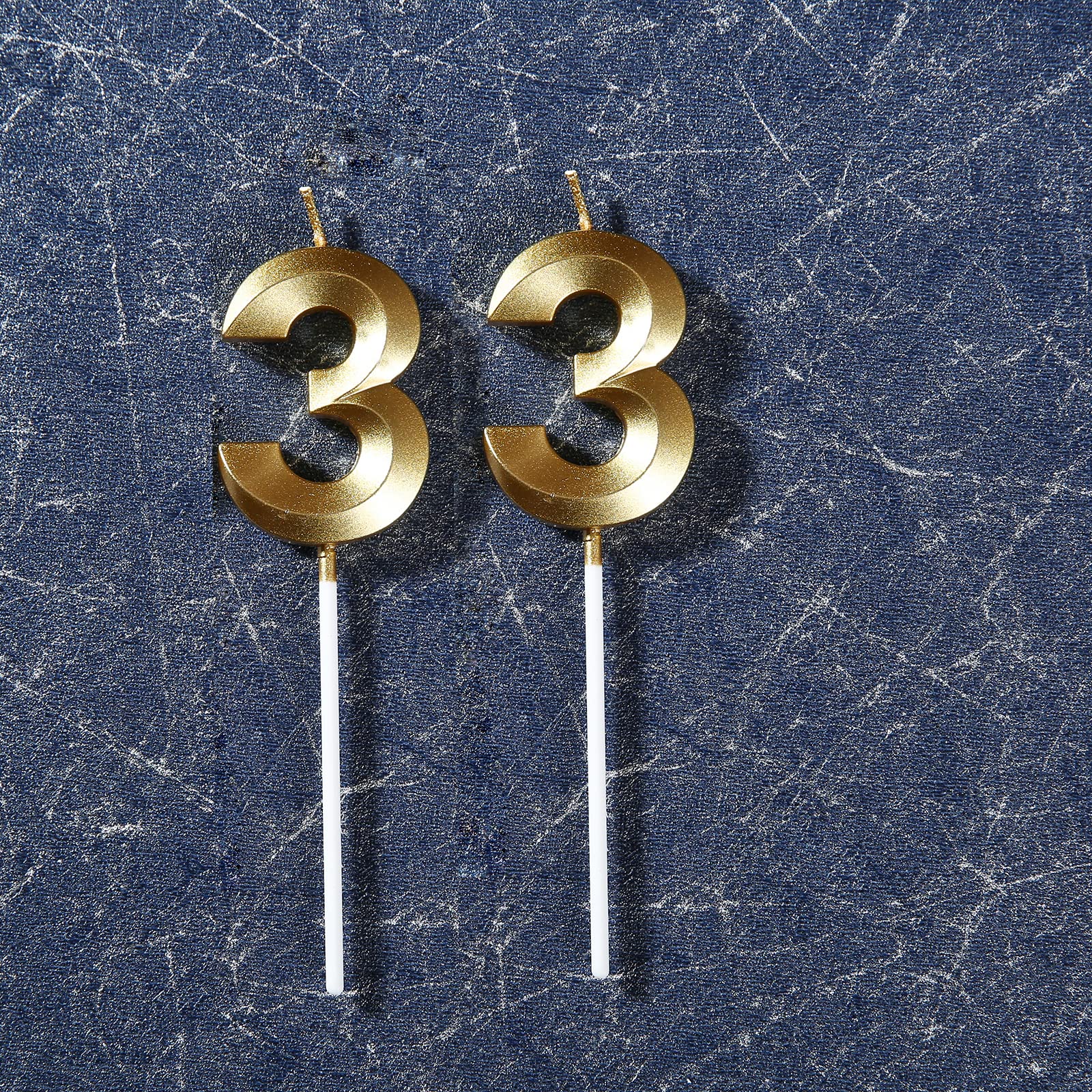 Two piece gold candles suitable for celebrations