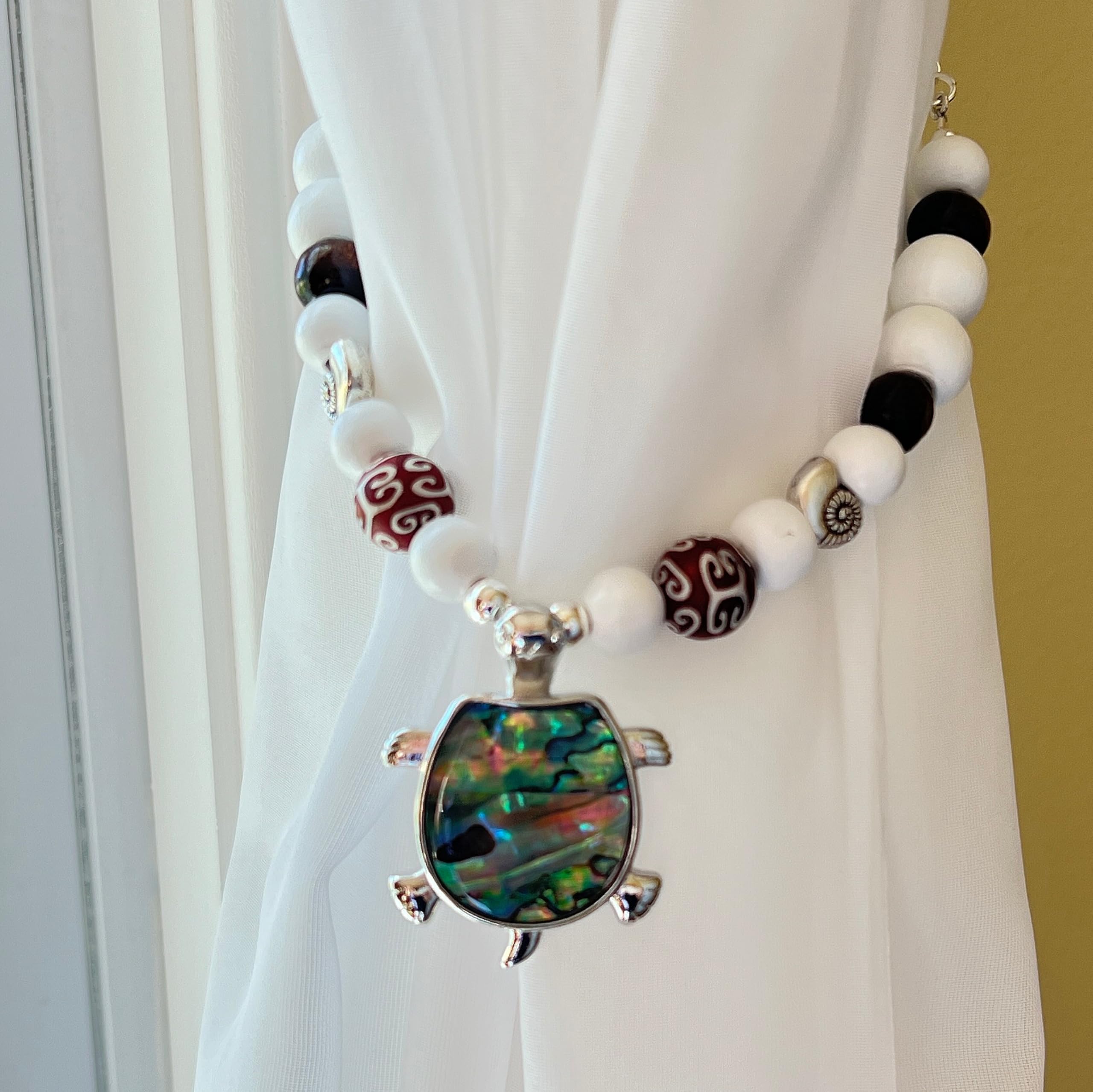 Pair of beaded curtain tiebacks for coastal window treatment