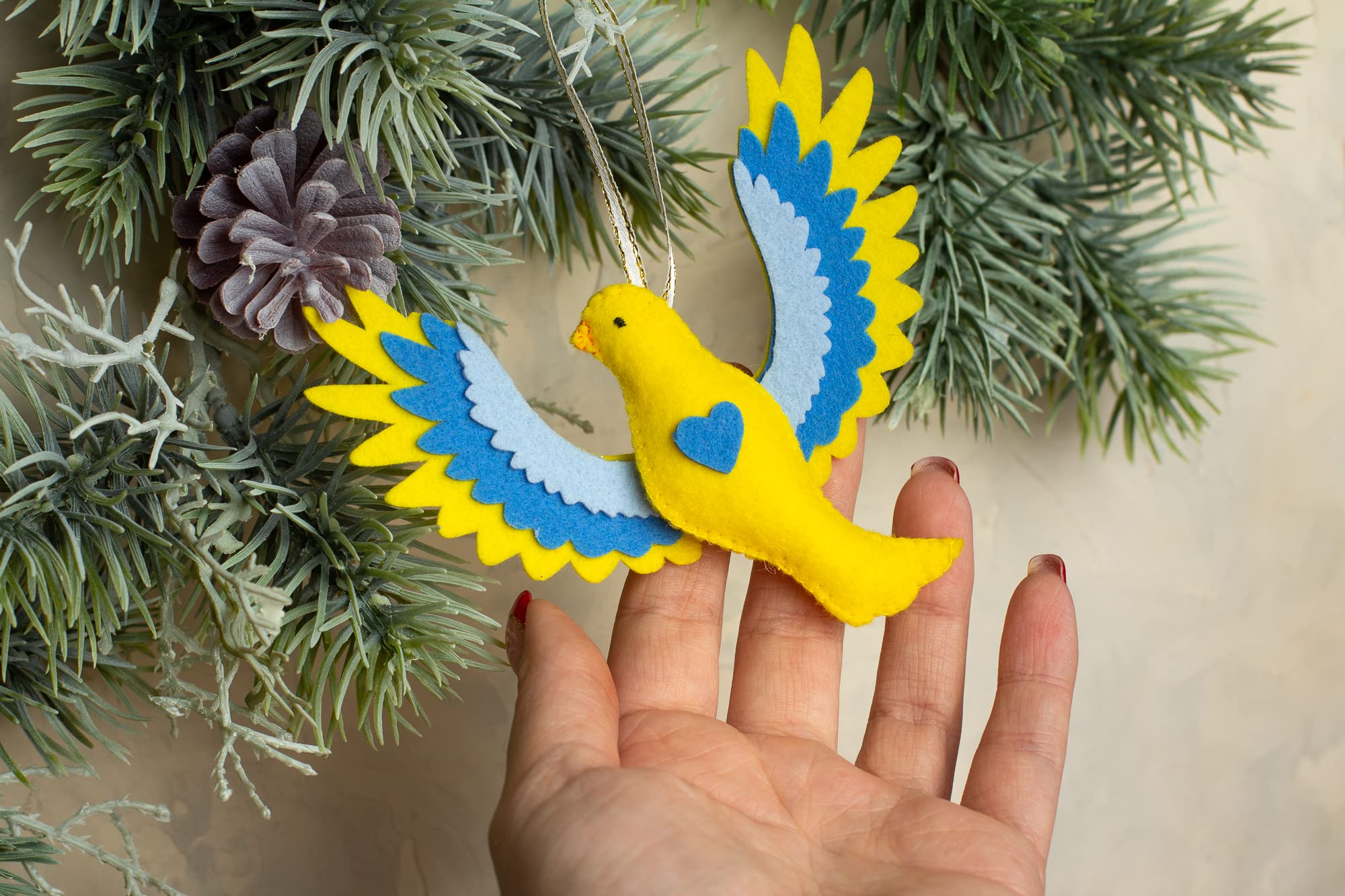 Ukrainian Christmas ornament for tree with blue yellow dove