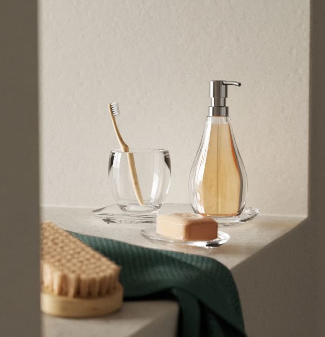 Ridges at base keep soap elevated and promote air drying Umbra Droplet