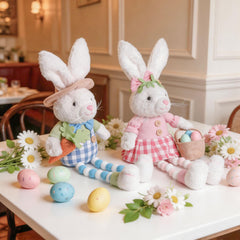 bunny plush holding bucket of Easter eggs and carrots