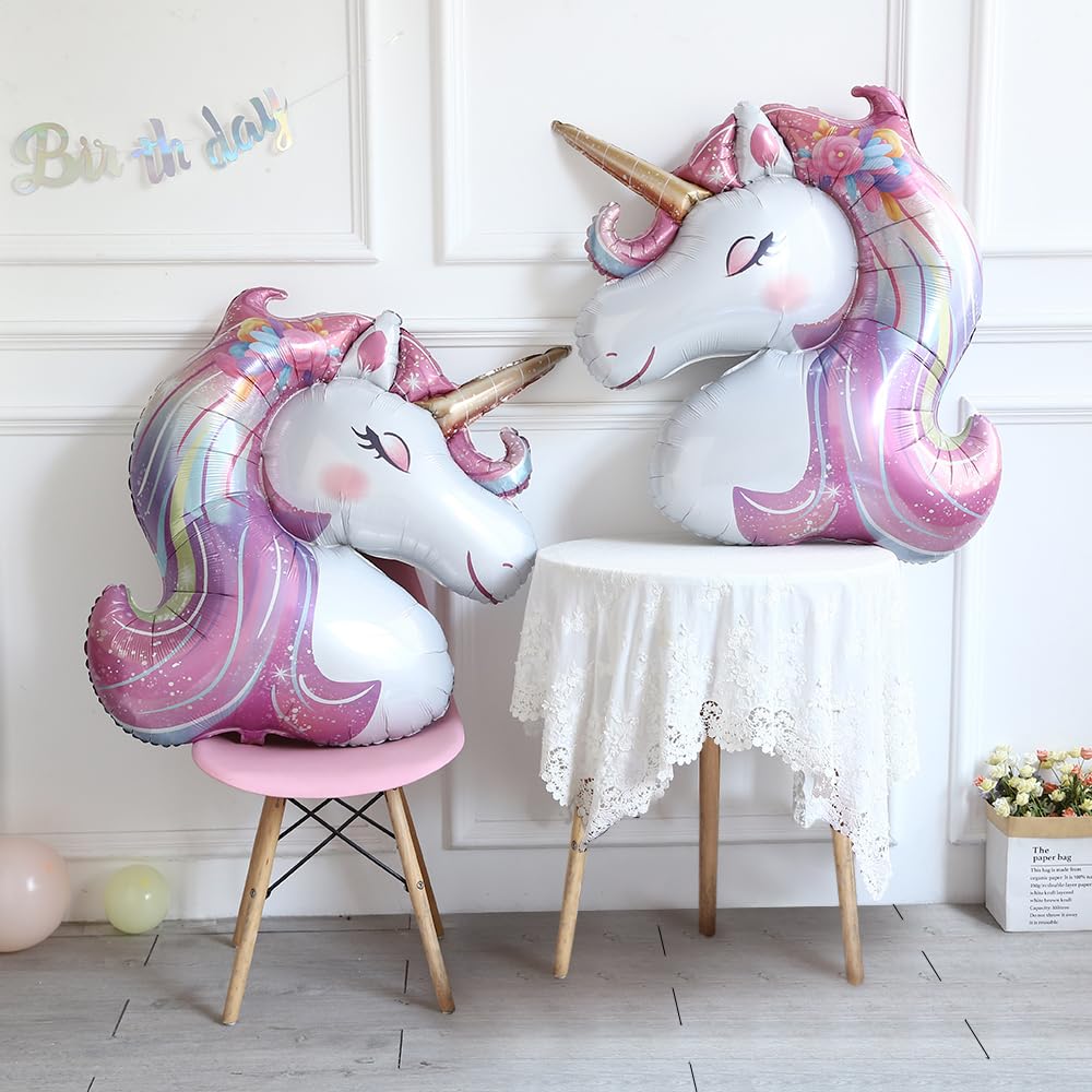 Two unicorn foil balloons in pink purple blue and white