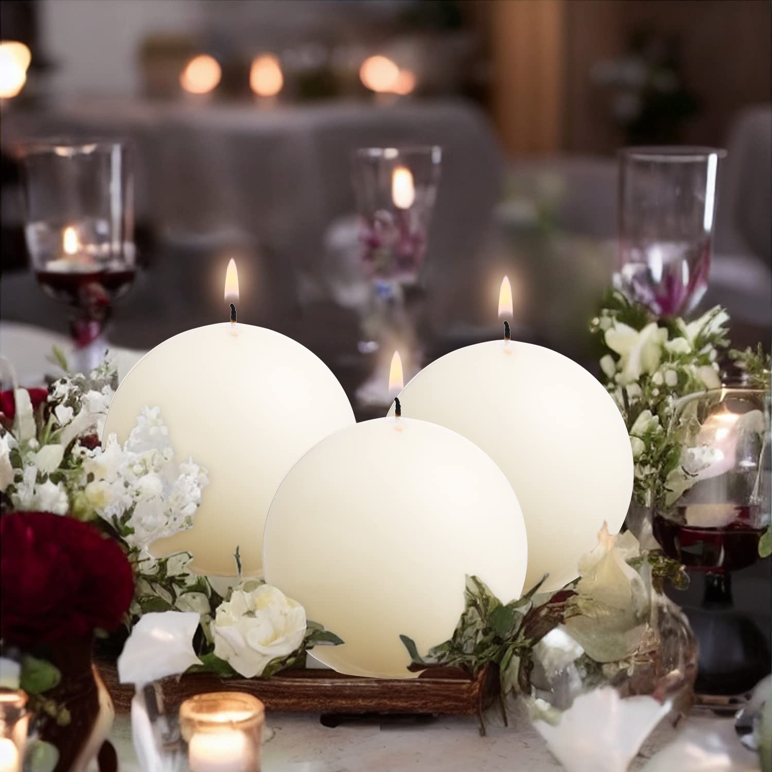 Weddings decor with ivory ball pillar candles