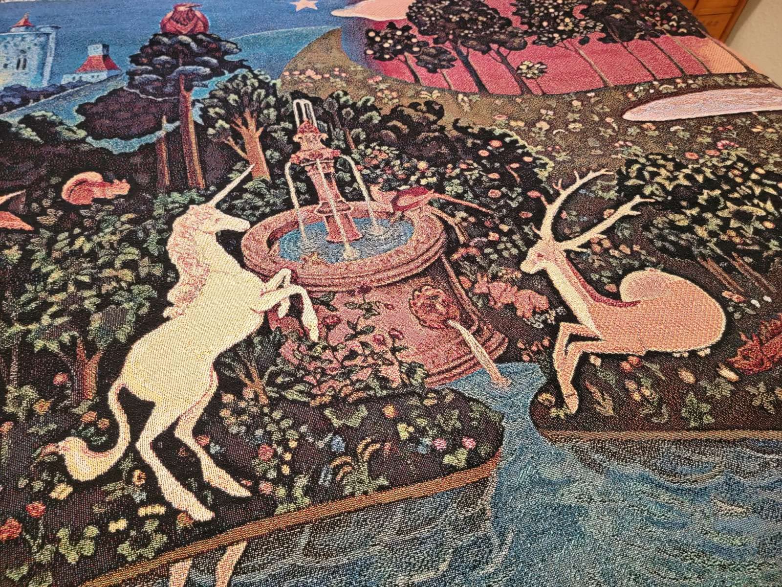 The Last Unicorn tapestry packaging showing size 54 x 90