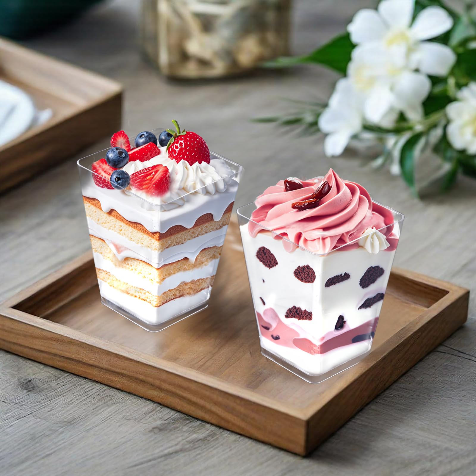 Close-up of 5oz clear dessert cups with spoons