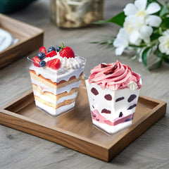 Close-up of 5oz clear dessert cups with spoons