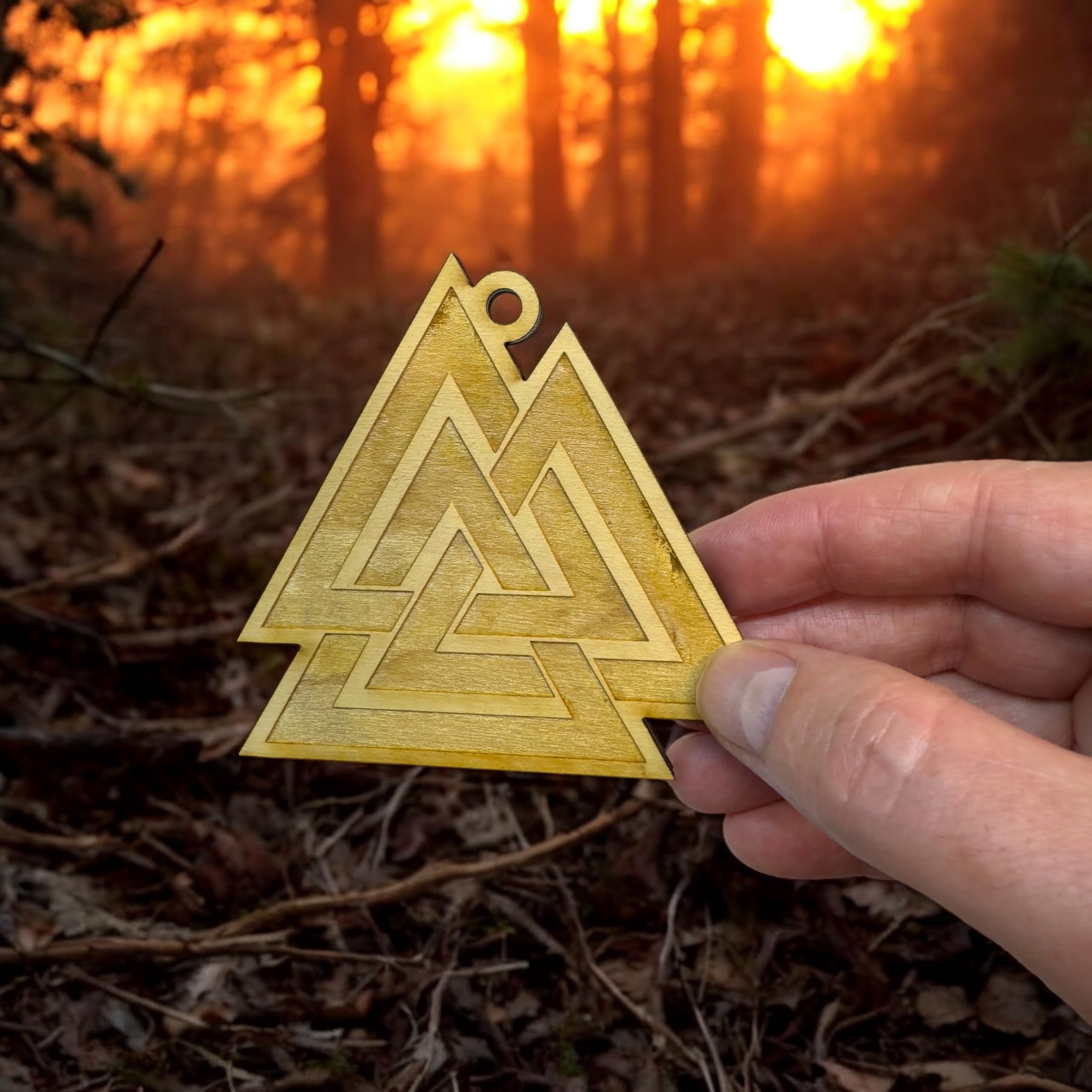 Valknut symbol ornament on wood