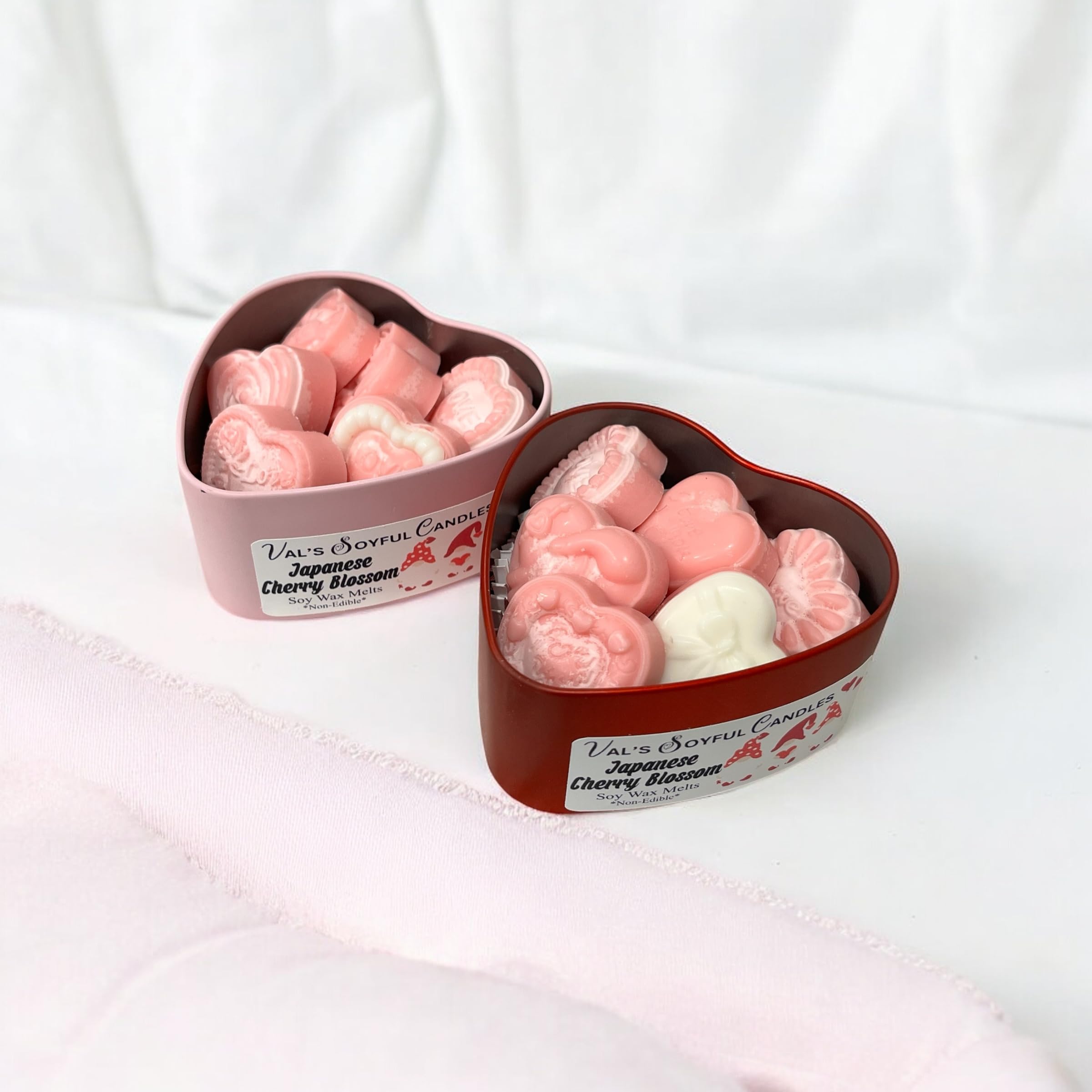 Six heart shaped melts presented in decorative tin