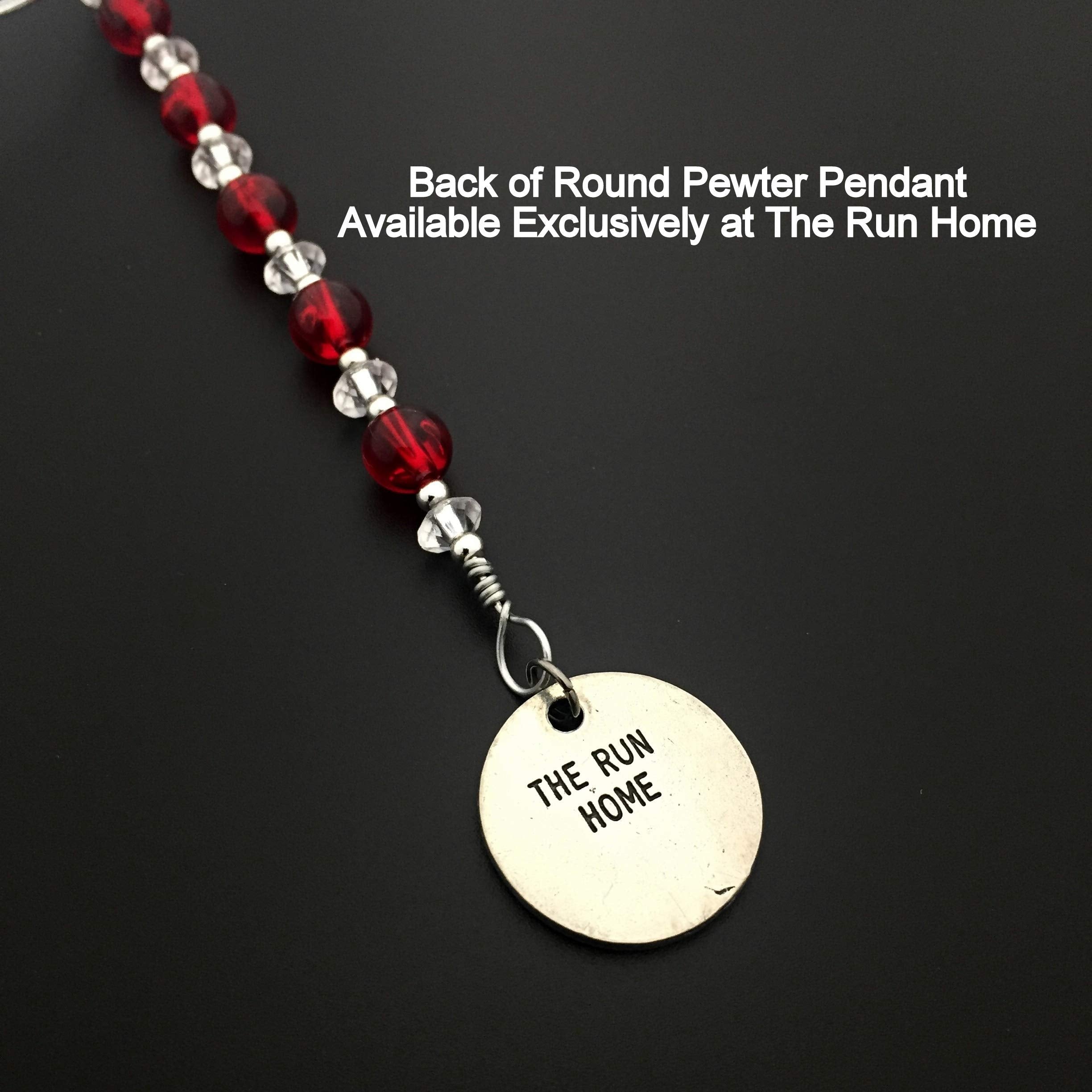 Ornament includes a silver stretch bow for hanging