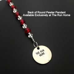 Ornament includes a silver stretch bow for hanging