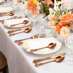 Dinner forks spoons knives and salad forks in rose gold copper