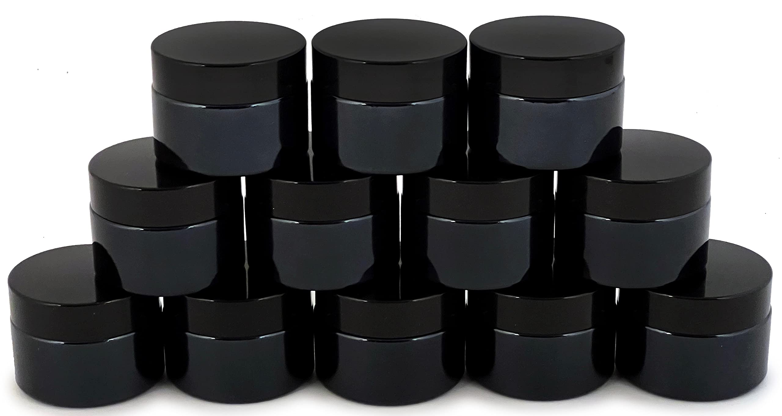 Compact round glass jars for cosmetics