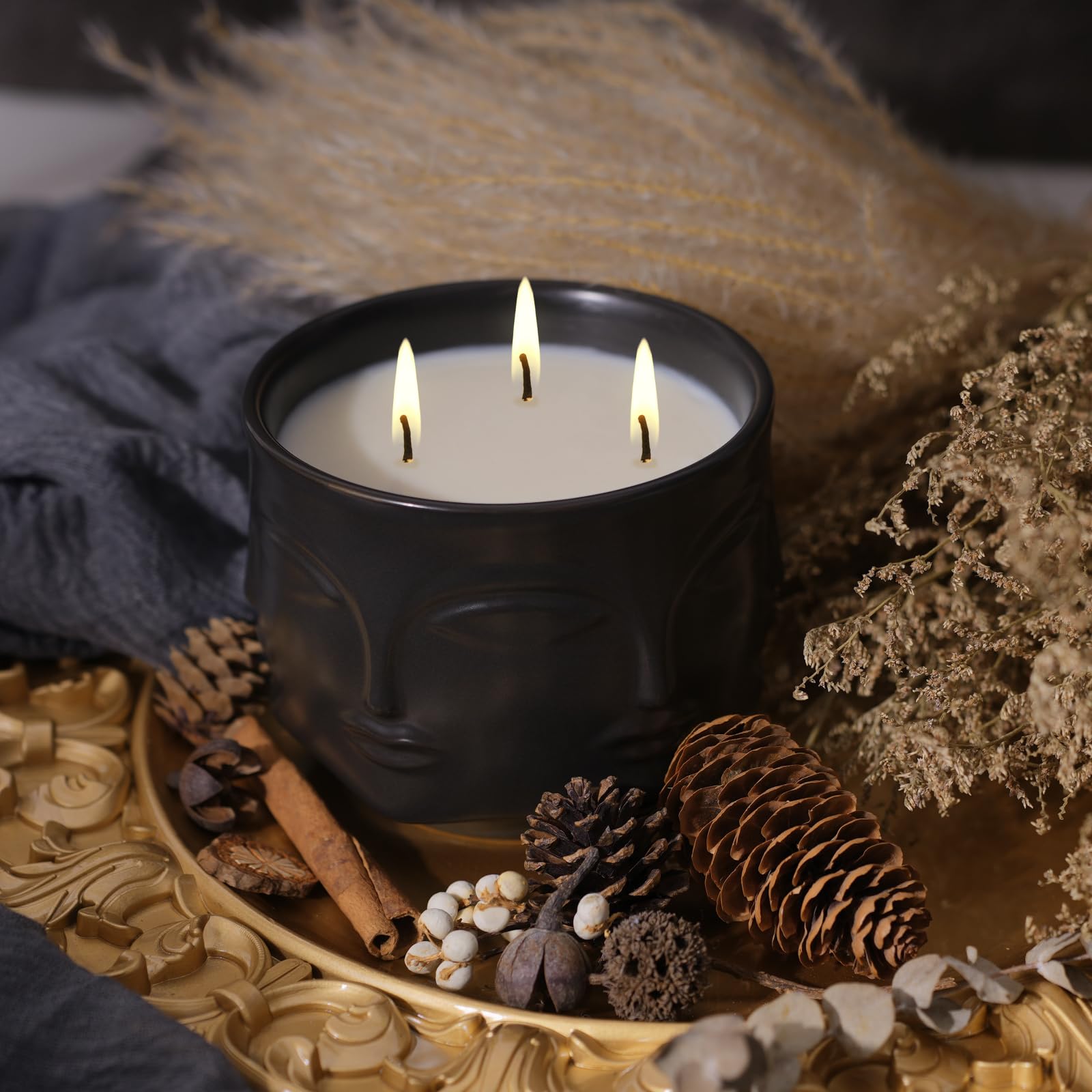 Viyffo matte black ceramic jar candle embossed with faces