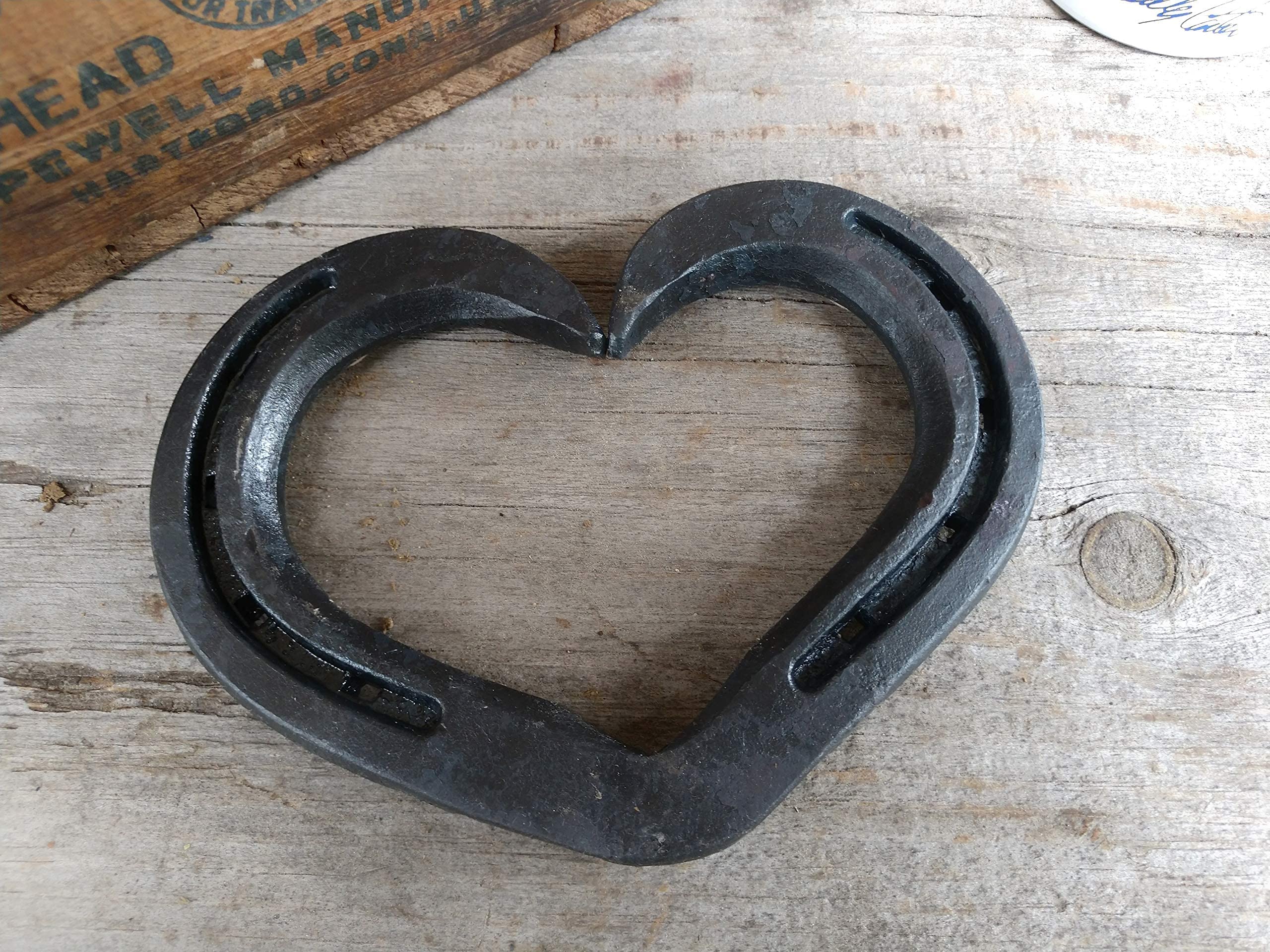Wall decor featuring horseshoe heart