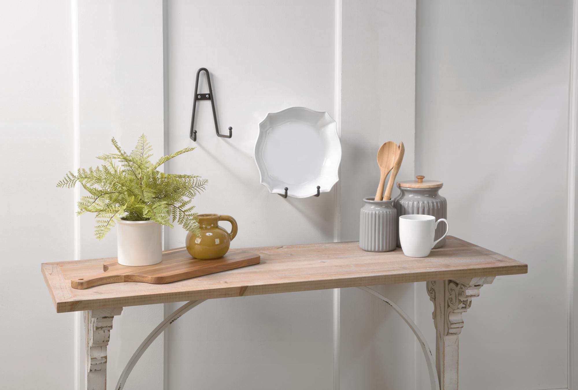 Wall hanging display rack plate shown on wall