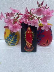 Table display with black and gold finish Bhairavi