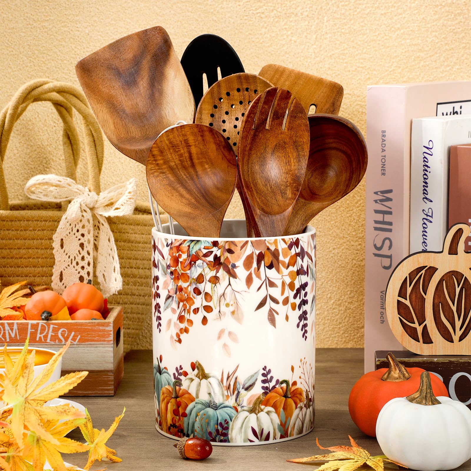 Utensil holder featuring autumn leaves pattern