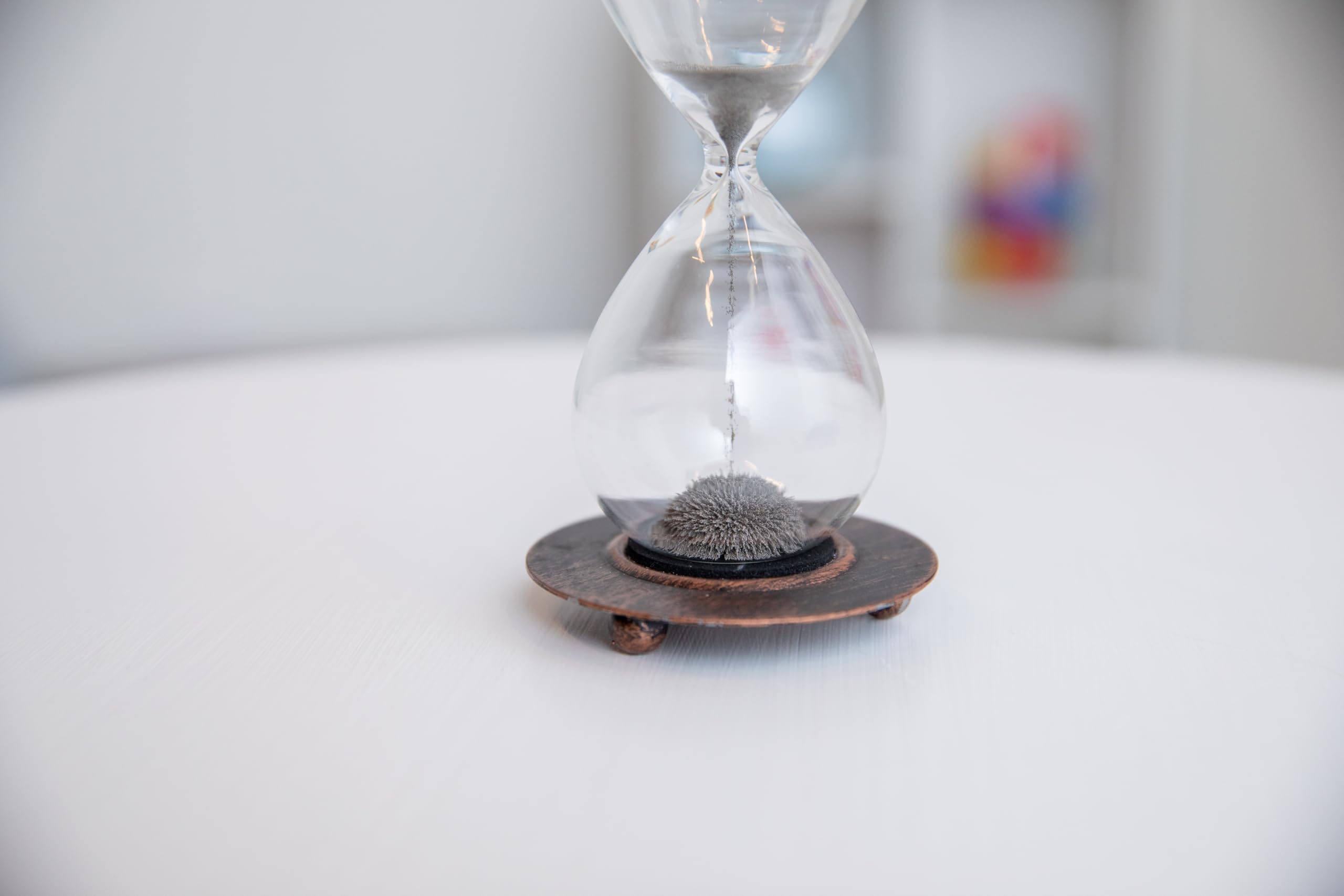 Magnetic Sandtimer by Way Back Toys showing base and sand shapes