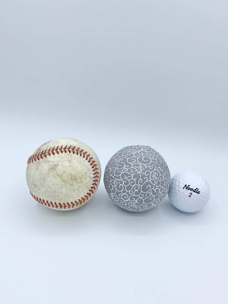 Neutral fabric balls shown in bowls and trays