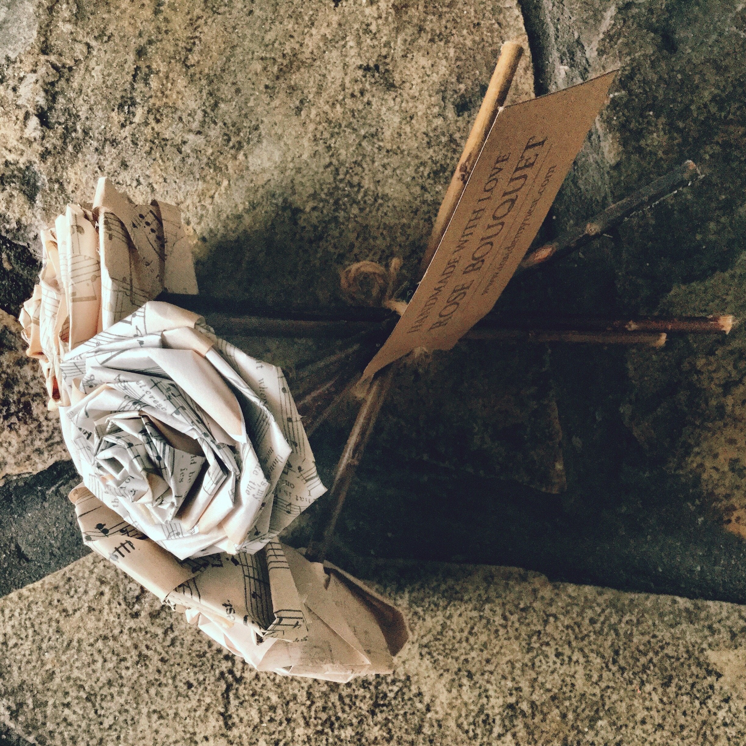 Artificial paper flower bouquet with rose heads similar to natural roses