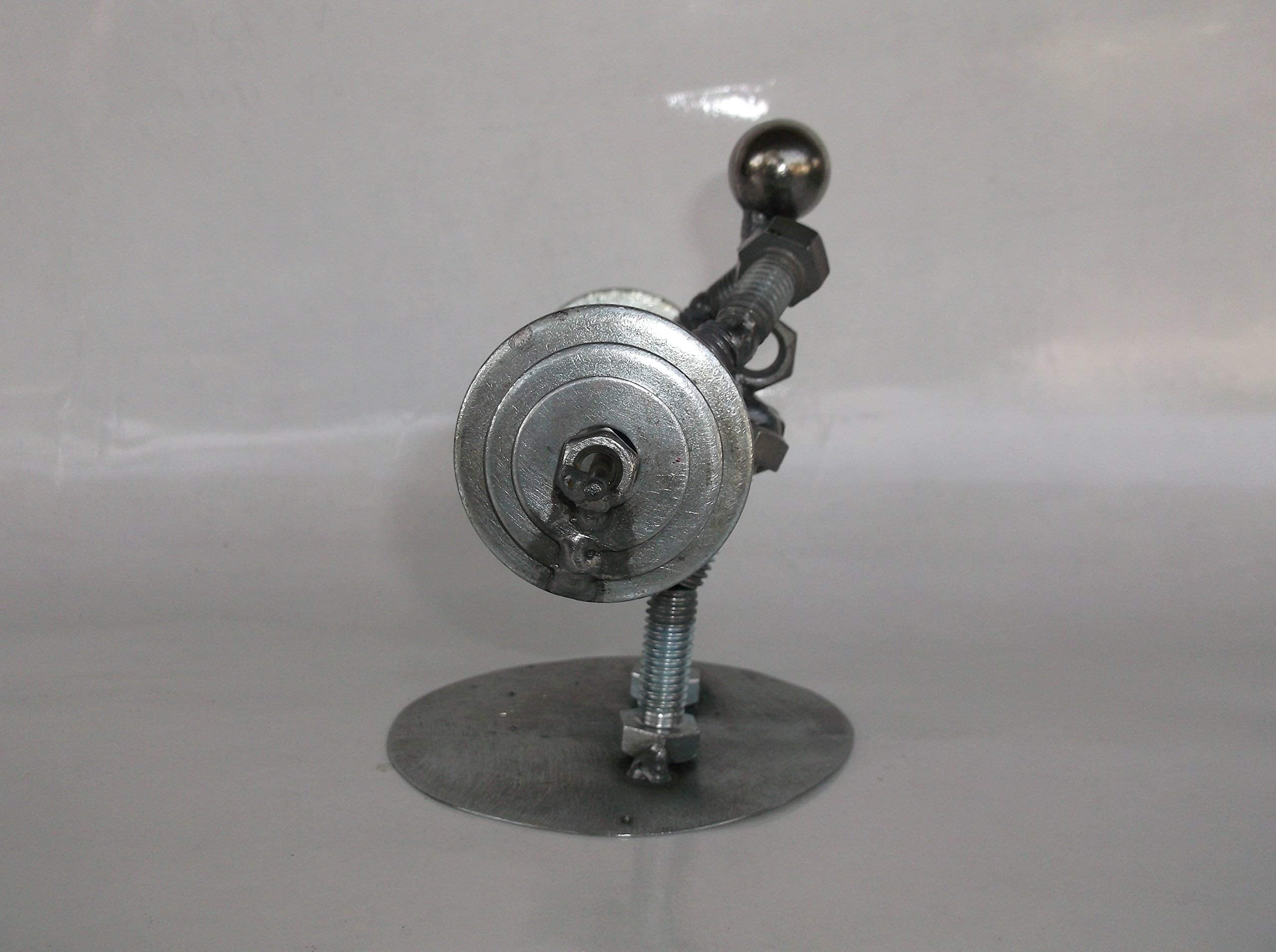Weight lifting figurine crafted from recycled metal