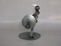 Weight lifting figurine crafted from recycled metal