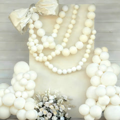 60 white 6 inch link balloons included