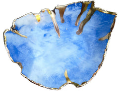 White blue and gold marbled ceramic ring dish close up