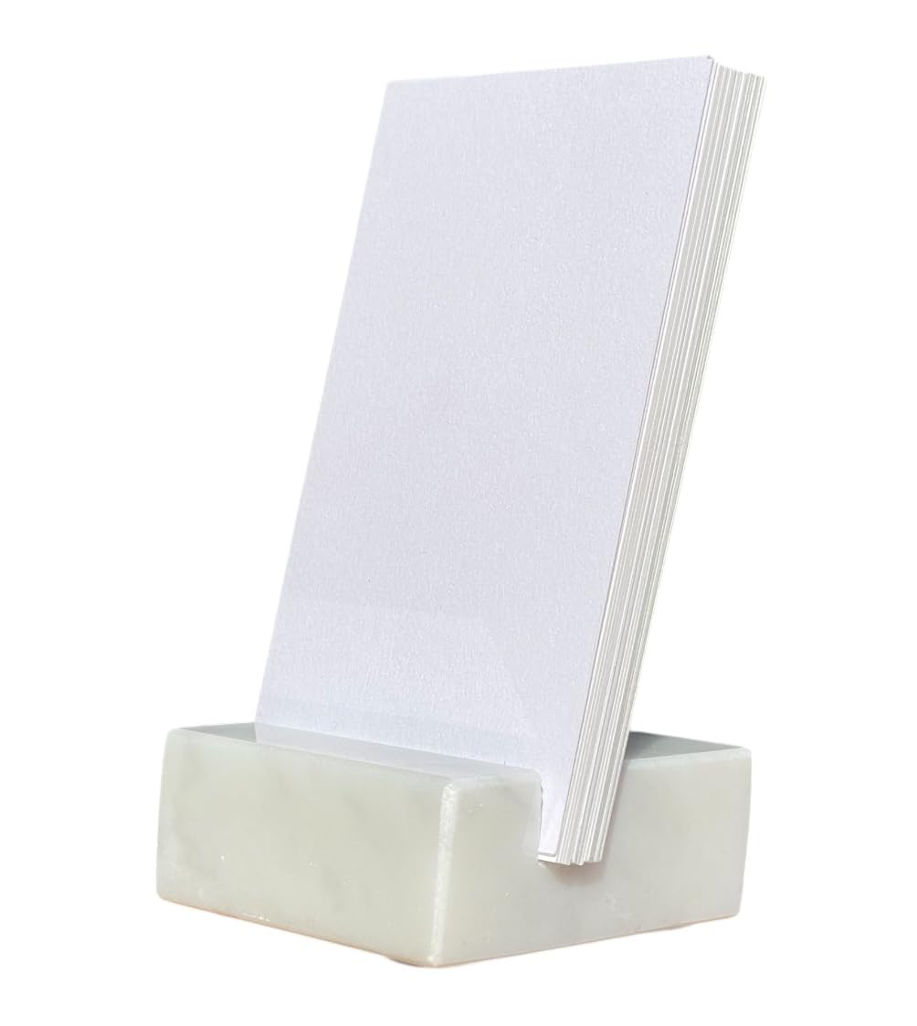 Vertical marble card holder on desk showing polished top and honed sides