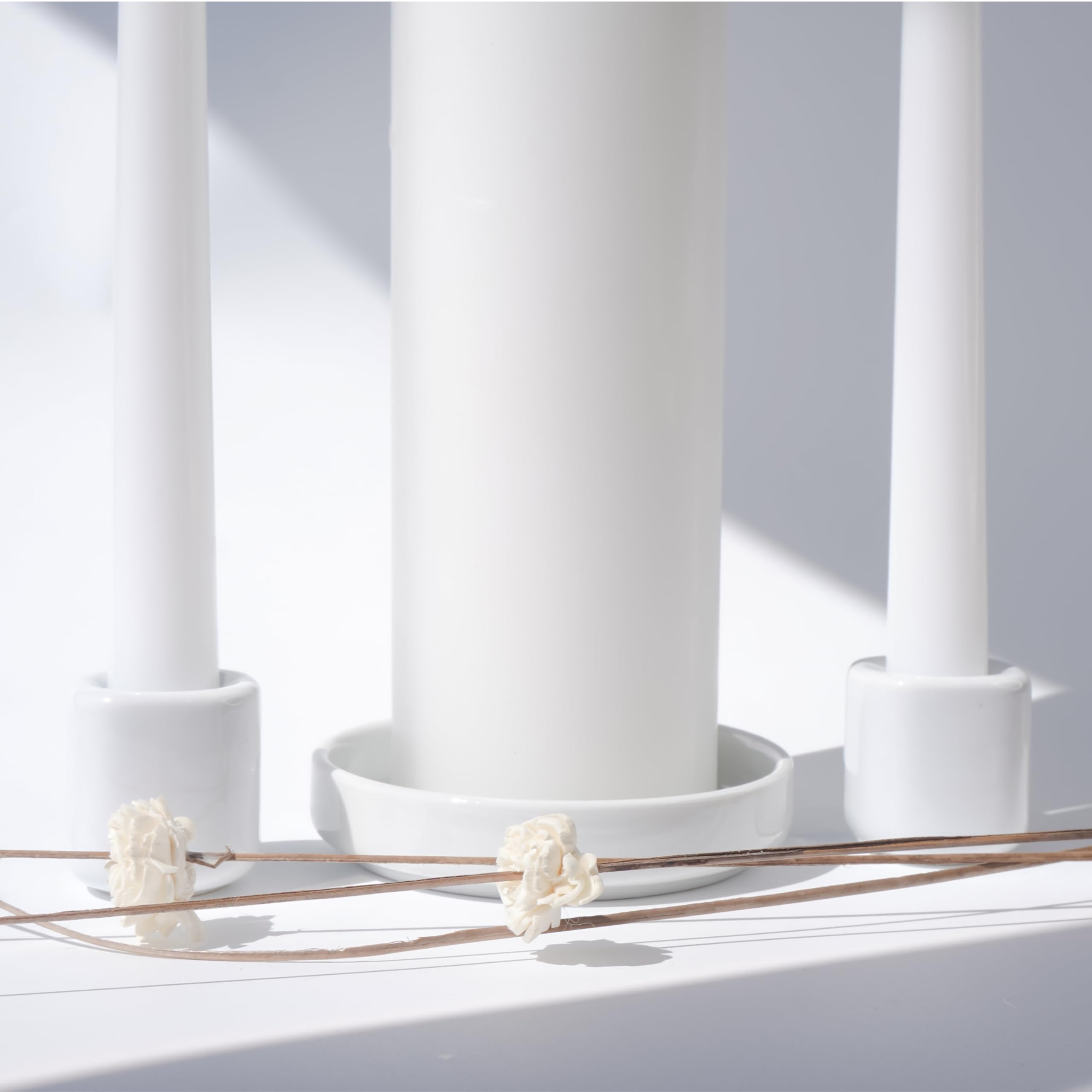 White porcelain taper candle holders with 7/8 inch diameter 1-1/2 inch height