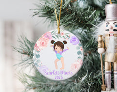 White porcelain gymnast girl ornament with gold ribbon