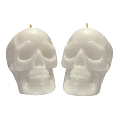 Two white skull candles in a 2 pack
