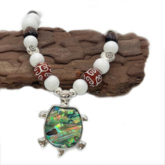 Abalone shell inlay with sea turtle charm for coastal decor