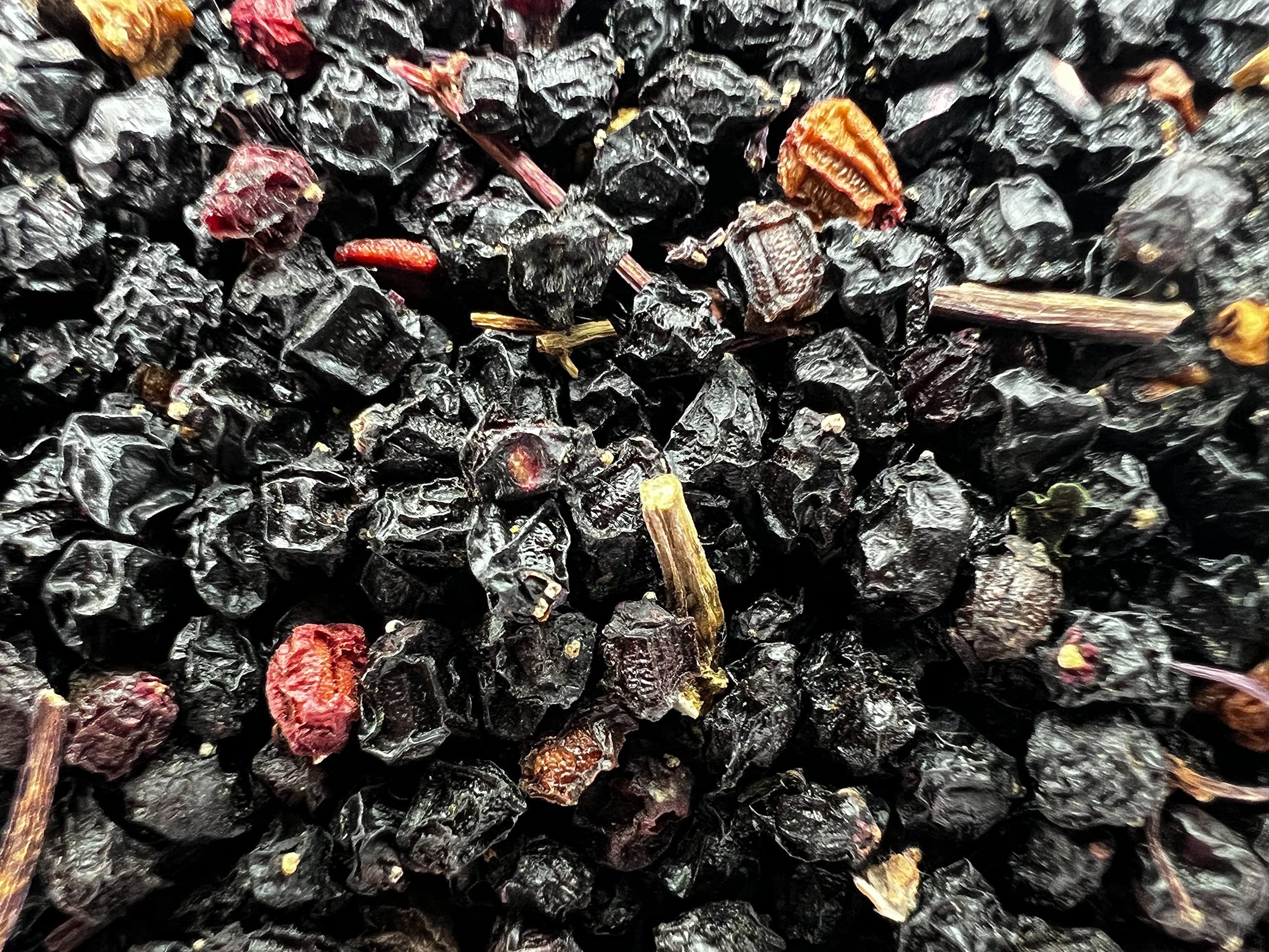 Elderberries with natural color variation and stems