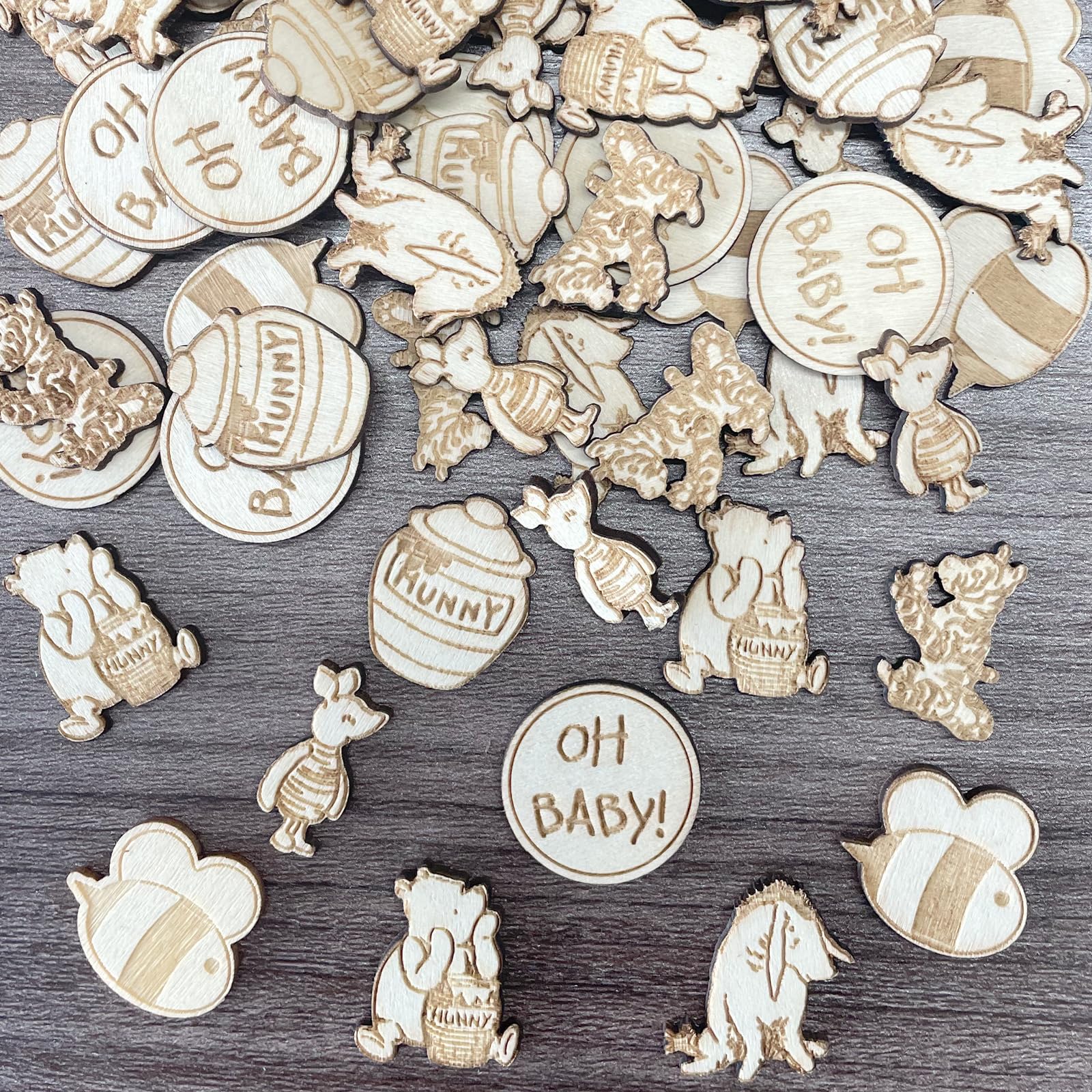 Winnie baby shower wooden confetti set on table