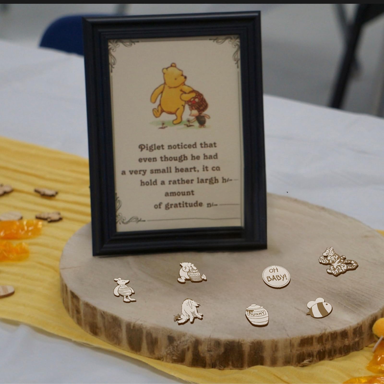 Winnie birthday decorations using wooden confetti